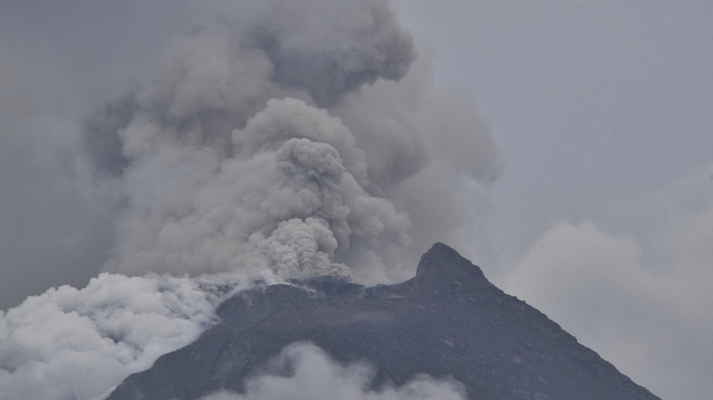 Mount Lewotobi Laki-Laki spews volcanic materials from its crater during an eruption, island of Flores, Indonesia, January 14, 2024. /CFP