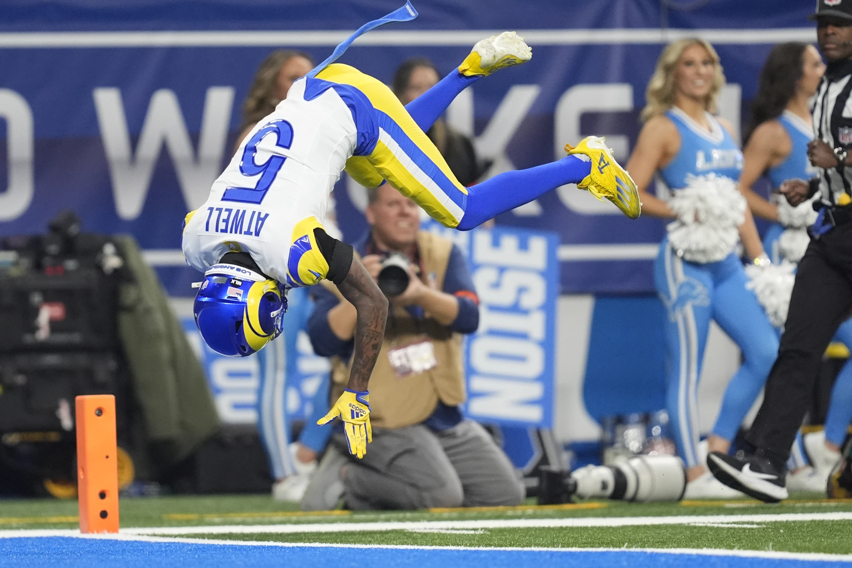 Wide receiver Tutu Atwell of the Los Angeles Rams scores a touchdown in the National Football Conference Wild Card Game against the Detroit Lions at Ford Field in Detroit, Michigan, January 14, 2024. /AP