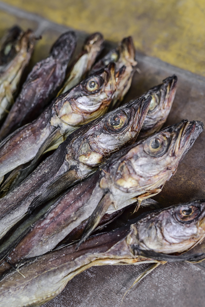 Dried Alaska pollock are for sale at a market in Yanbian, Jilin Province on October 10, 2015. /CFP