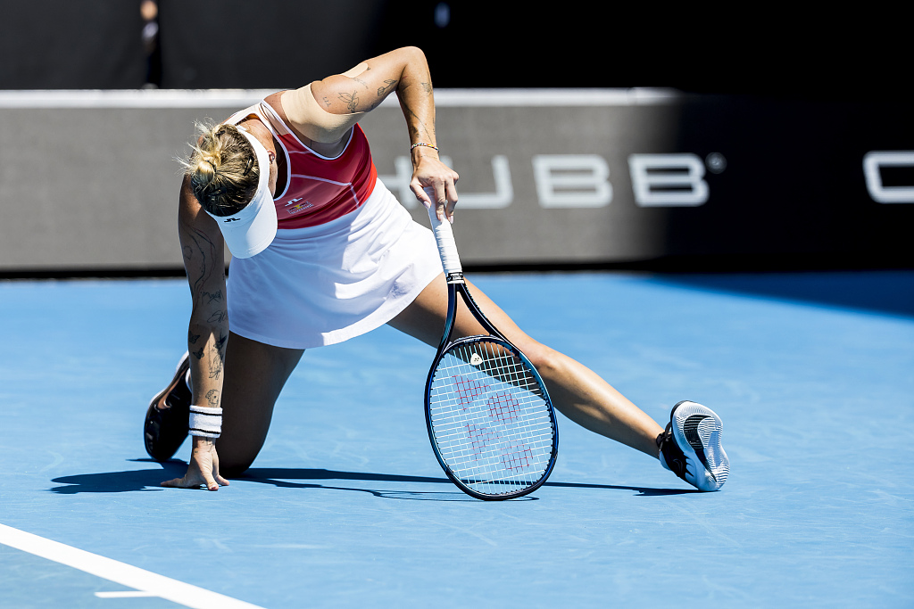 Marketa Vondrousova of the Czech Republic falls to the ground during her singles' match at Australian Open in Melbourne, Australia, January 15, 2024. /CFP