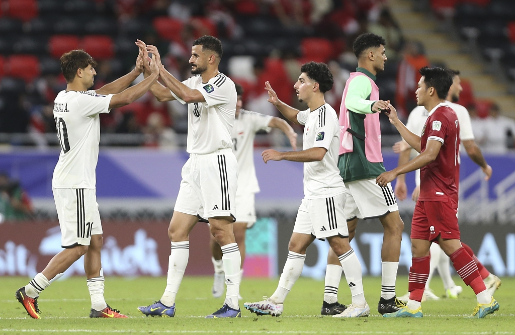 Iraqi players celebrate during their AFC Asian Cup clash against Indonesia in Al Rayyan, Qatar, January 15, 2024. /CFP