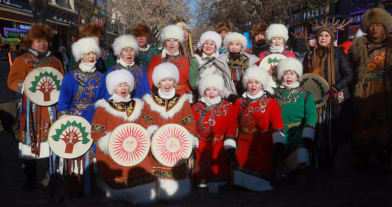 Hezhe people perform traditional dances and sing songs to demonstrate their unique culture to visitors in Harbin City, Heilongjiang Province, January 15, 2024. /CFP