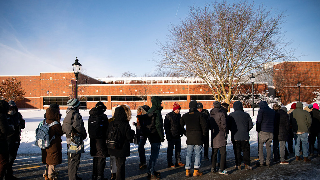 Attendees wait in line outside prior to a campaign event with former U.S. President Donald Trump, not pictured, at Simpson College in Indianola, Iowa, U.S., January 14, 2024. /CFP