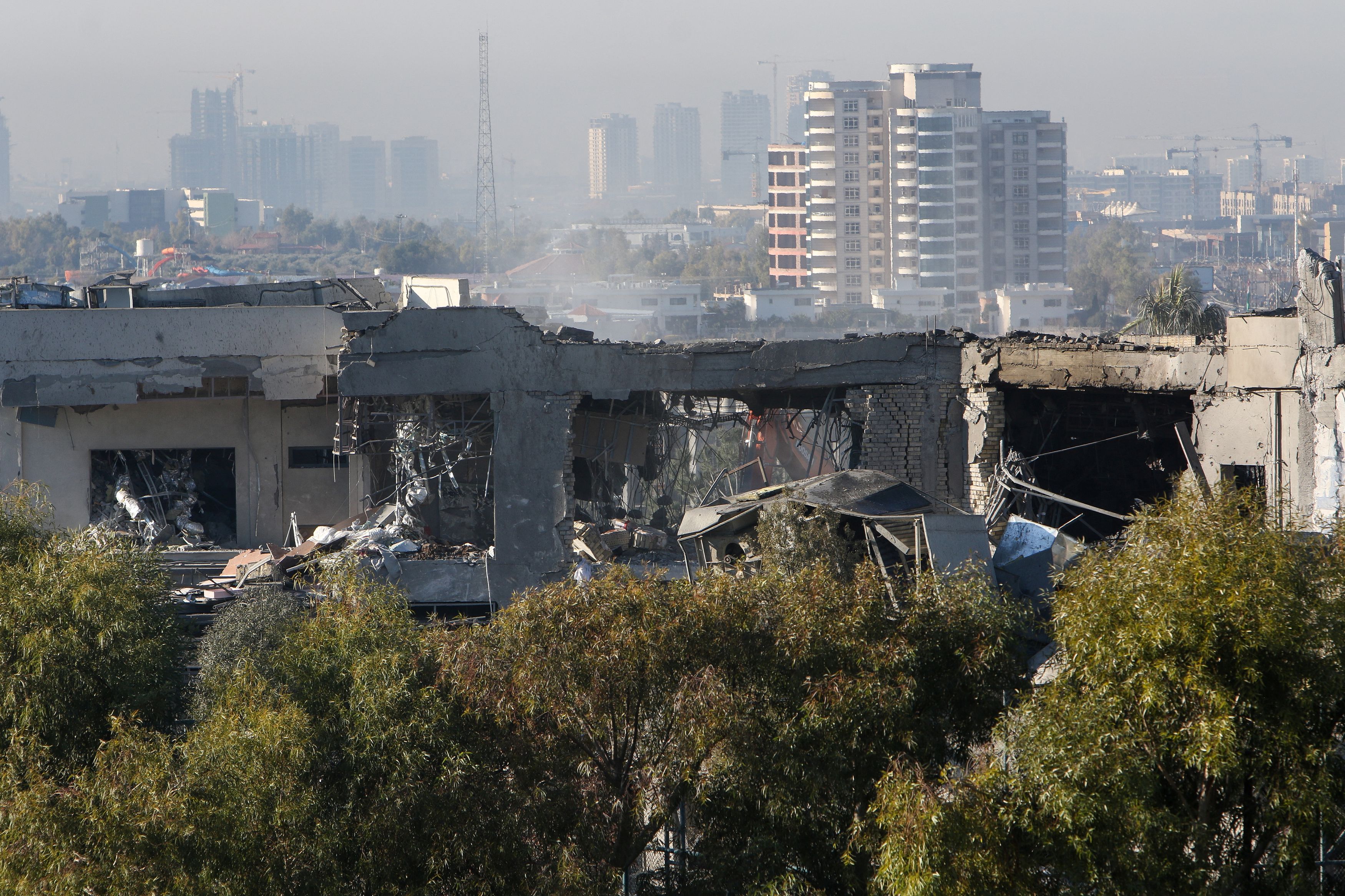 A view of a damaged building following missile attacks, in Erbil, Iraq, January 16, 2024. /Reuters