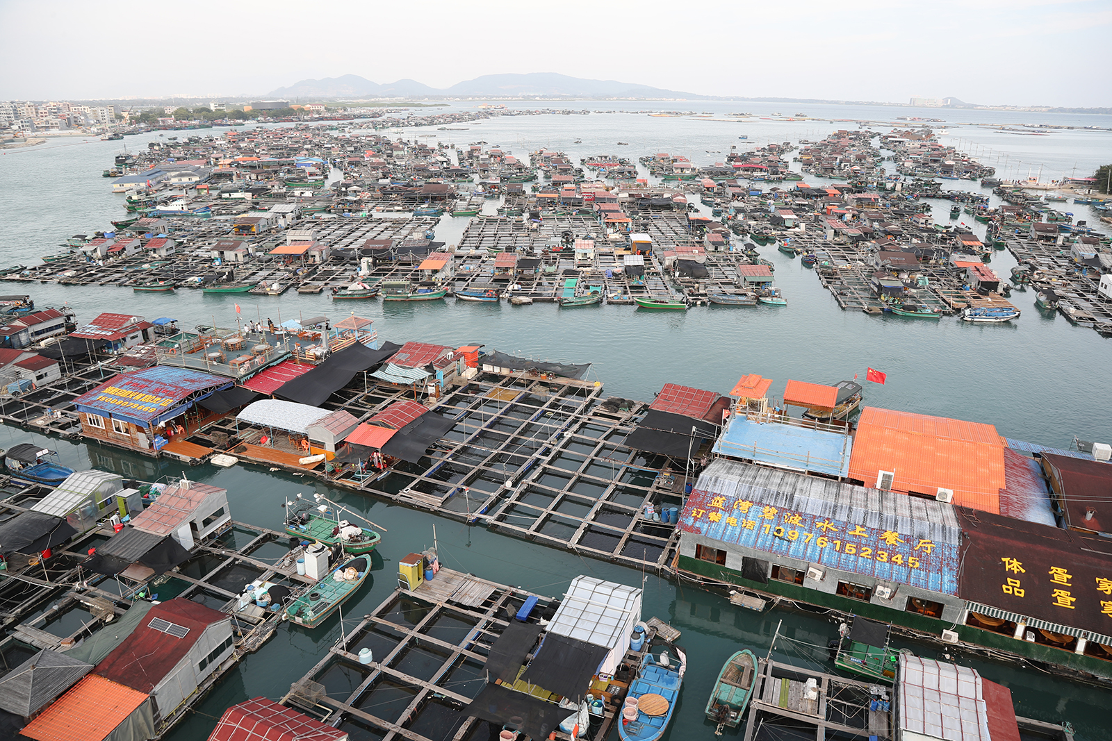 An aerial view of Danjia floating fishing village in Lingshui, Hainan Province on December 25, 2023 /CGTN