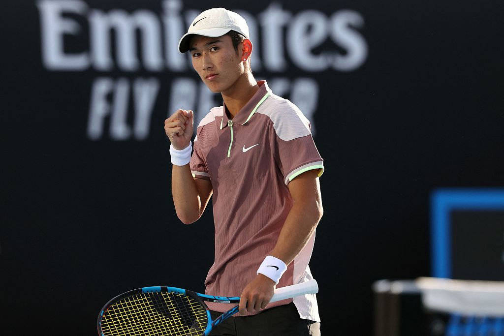 Shang Juncheng reacts after winning a point against Mackenzie McDonald in their men's singles match on day three of the Australian Open in Melbourne, Australia, January 16, 2024. /CFP