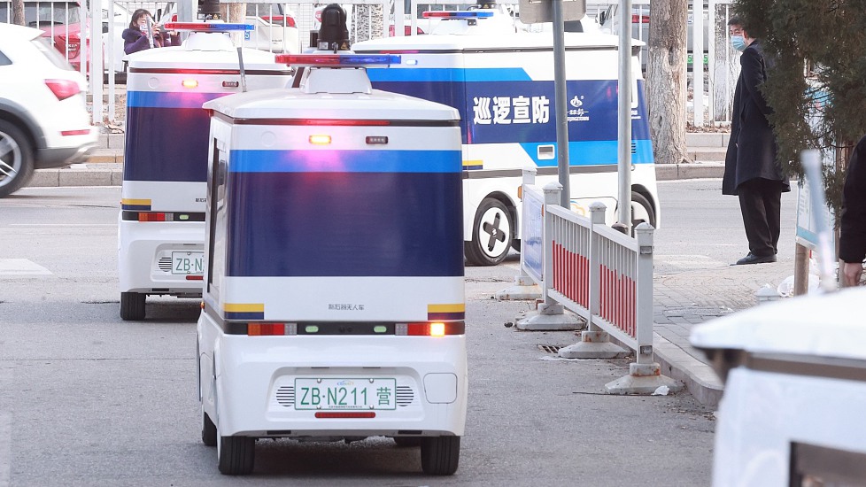 The self-driving patrol cars running on the public roads in the autonomous driving demonstration area in Yizhuang, Beijing, January 16, 2024. /CFP