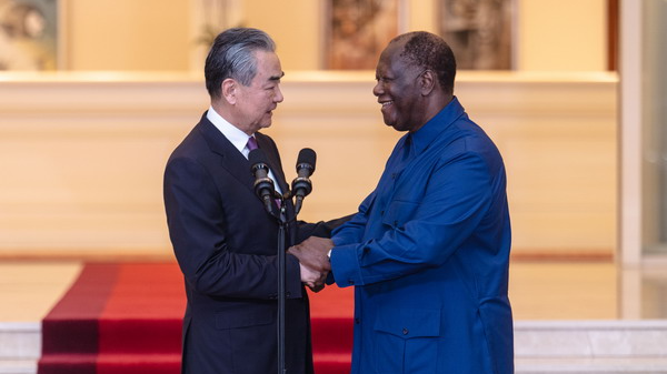 President of Cote d'Ivoire Alassane Ouattara (R) shakes hands with Chinese Foreign Minister Wang Yi, in Abidjan, Cote d'Ivoire, January 17, 2024. /Chinese Foreign Ministry