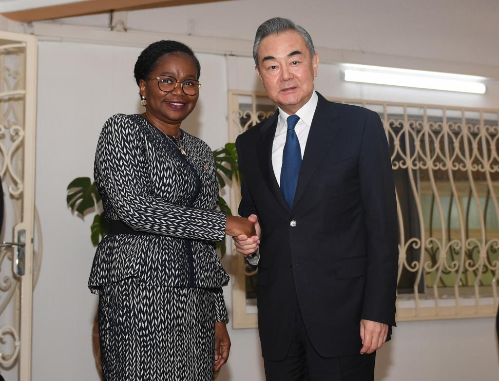 Togolese Prime Minister Victoire Sidemeho Tomegah Dogbe (L) shakes hands with visiting Chinese Foreign Minister Wang Yi, during their meeting in Lome, Togo, January 17, 2024. /Xinhua