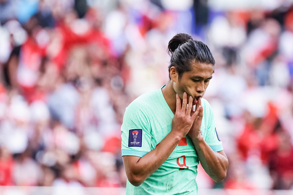 China's Zhang Yuning reacts after missing a chance during their Asian Cup clash with Lebanon at Al Thumama Stadium in Doha, Qatar, January 17, 2024. /CFP