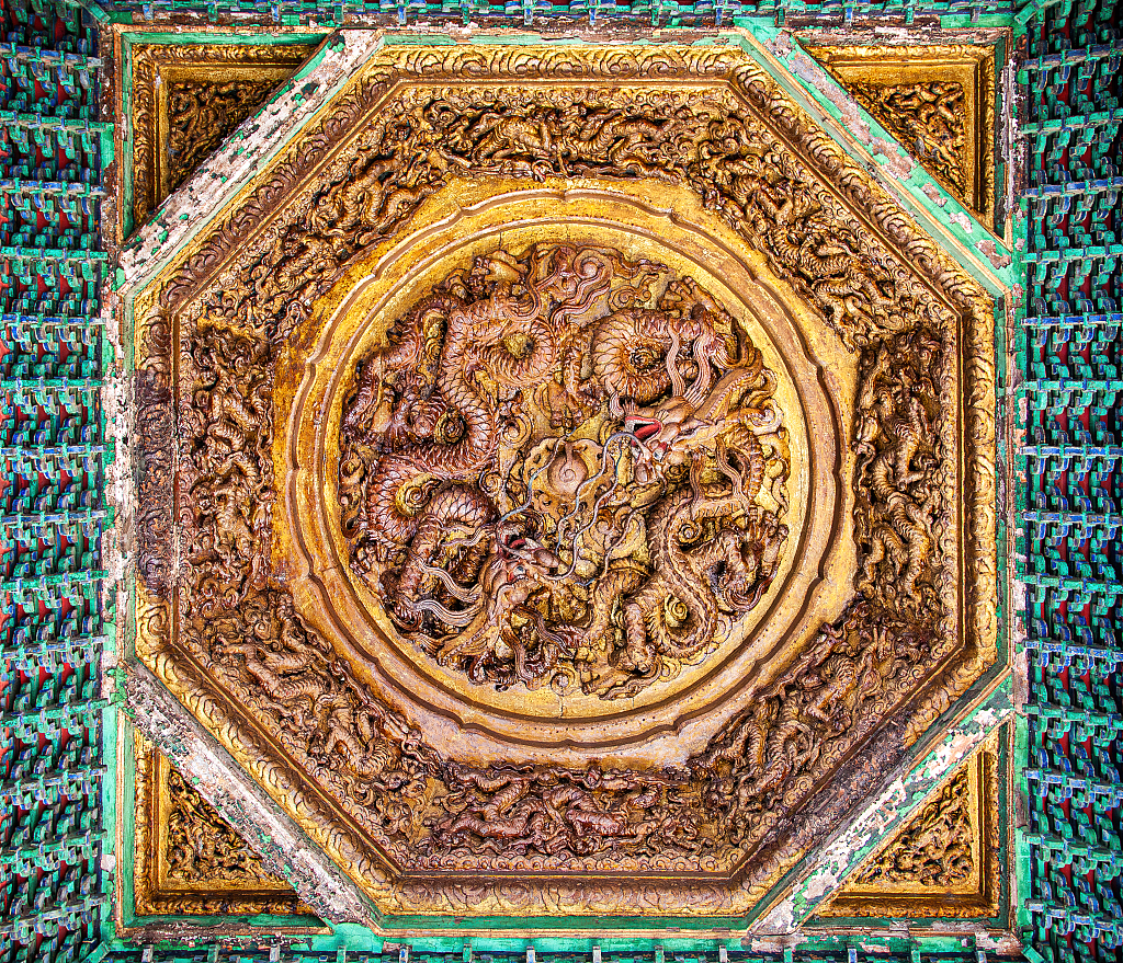 A file photo shows the interior roof featuring figures of the loong at a pavilion in the Forbidden City in Beijing. /CFP