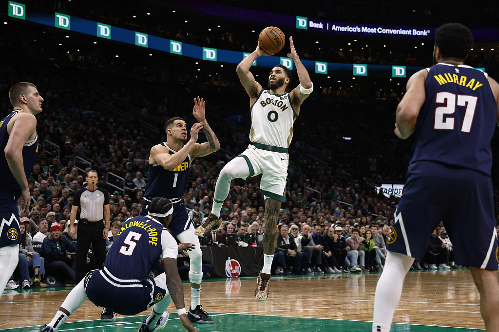 Jayson Tatum (#0) of the Boston Celtics shoots in the game against the Denver Nuggets at TD Garden in Boston, Massachusetts, January 19, 2024. /CFP