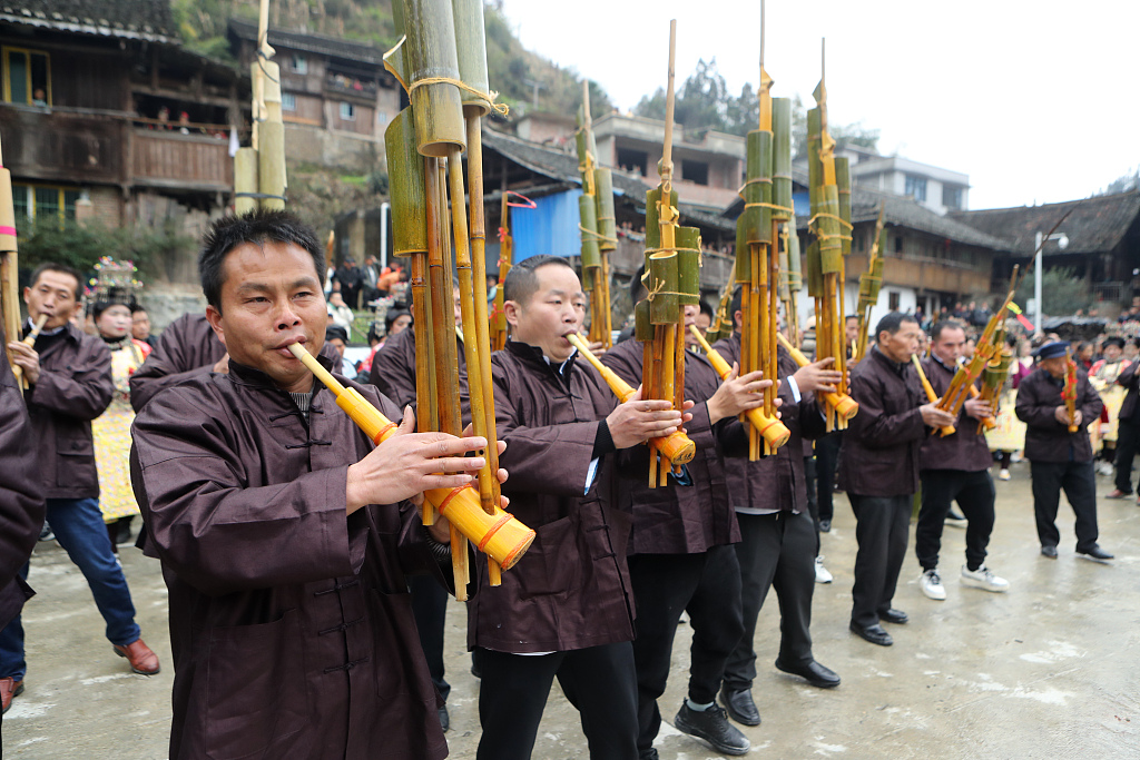 Dong people play the lusheng, a traditional musical instrument, to celebrate Dong New Year in Qiandongnan Miao and Dong Autonomous Prefecture, Guizhou Province, January 11, 2024. /CFP