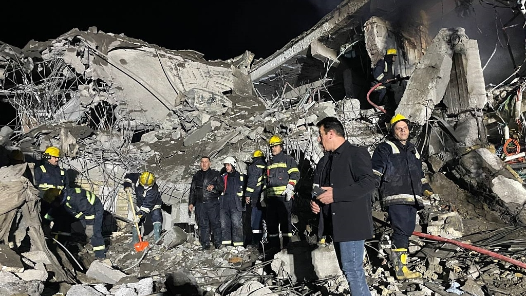 Teams carry out search and rescue operations after unmanned aerial vehicle (UAV) attacks in Erbil, Iraq on January 16, 2024. /CFP