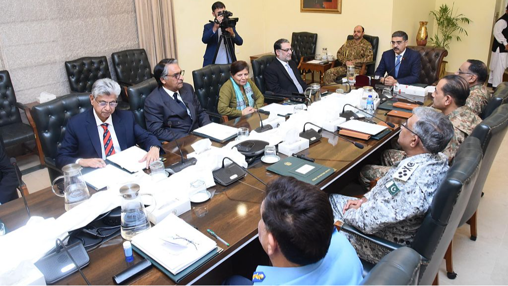 In this handout photograph taken and released by the Pakistan's Press Information Department (PID) on January 19, 2024, Pakistan's Prime Minister Anwar-ul-Haq Kakar (2ndR) chairs a National Security Committee meeting along with armed forces chiefs and other government officials in Islamabad. Pakistan and Iran 