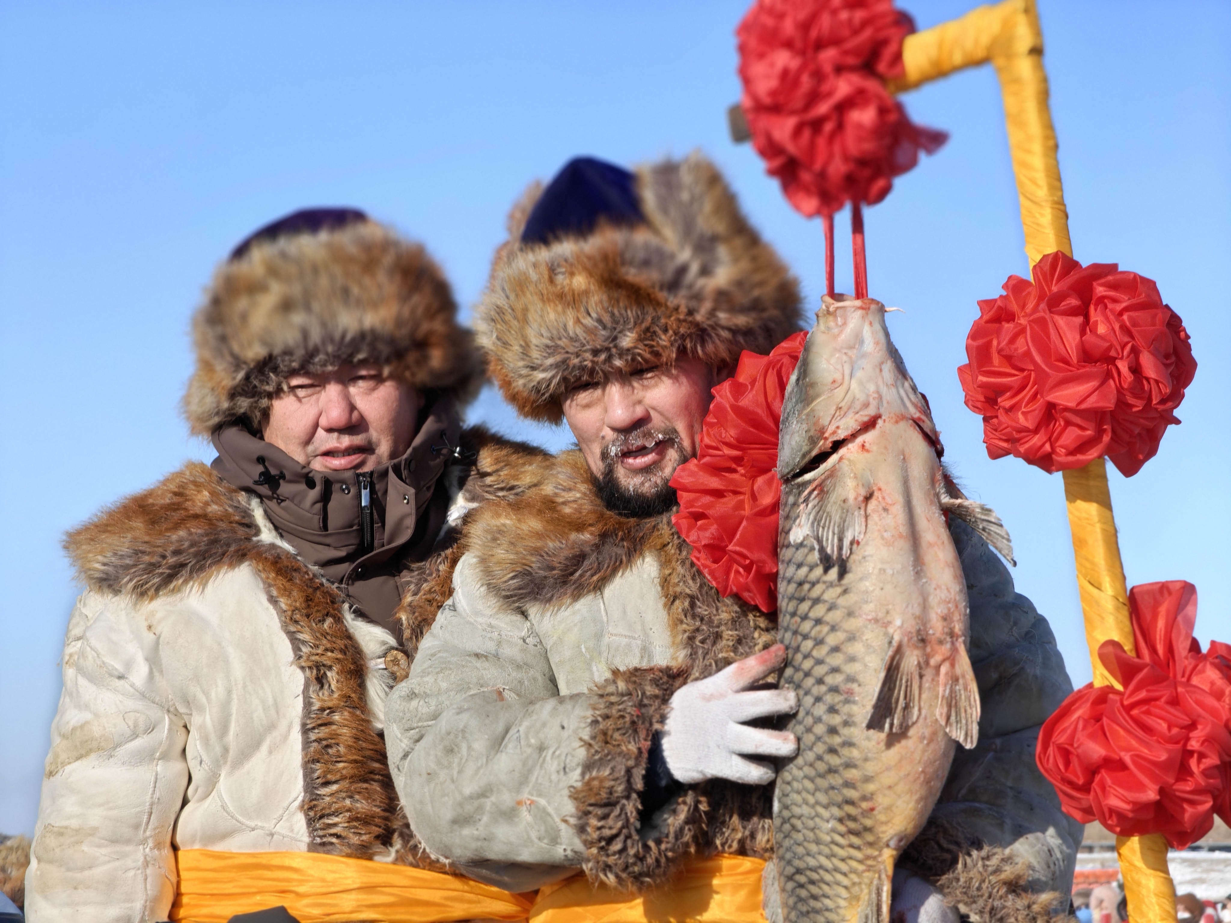 The first carp fish displayed at the Ulungur Lake Winter Fishing Festival at Fuhai County, Altay region, northwest China's Xinjiang Uygur Autonomous Region, January 20, 2024. /CGTN