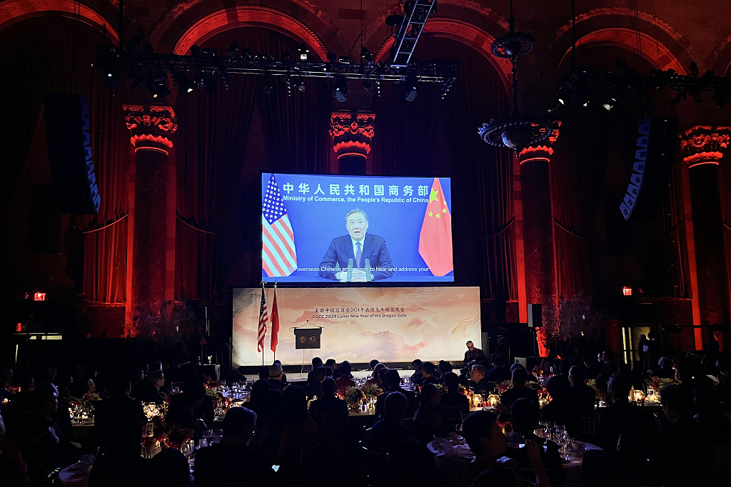 Chinese Commerce Minister Wang Wentao delivers a speech via video link at a gala held by China General Chamber of Commerce – USA in New York, U.S., on January 18, 2024. /CFP