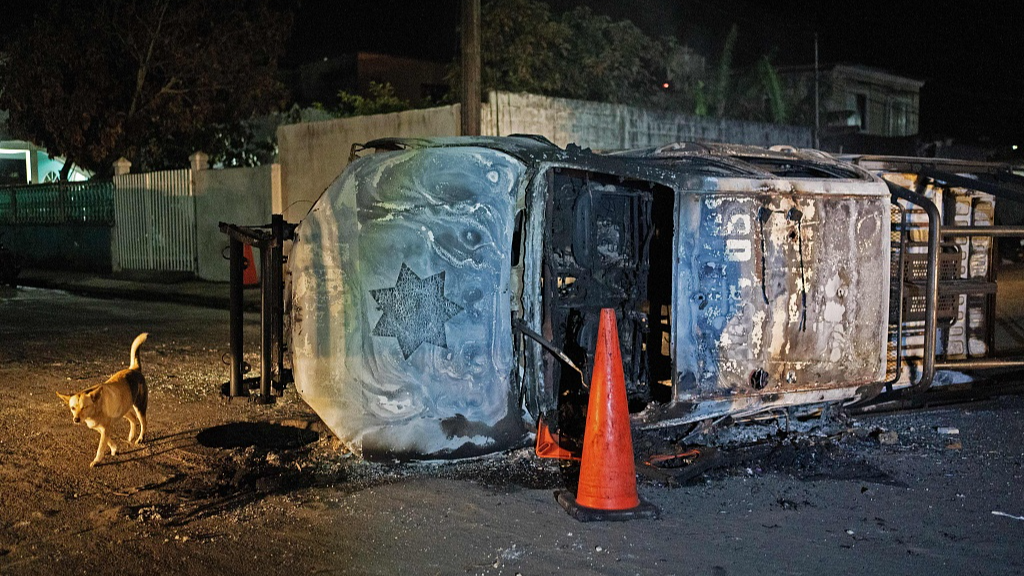 A patrol vehicle that was torched by protesters demonstrating against the death of 27-year-old Brandon Arellano Cruz, who was allegedly killed by members of the Municipal Police in Lerdo de Tejada, Veracruz, Mexico, on January 19, 2024. /CFP