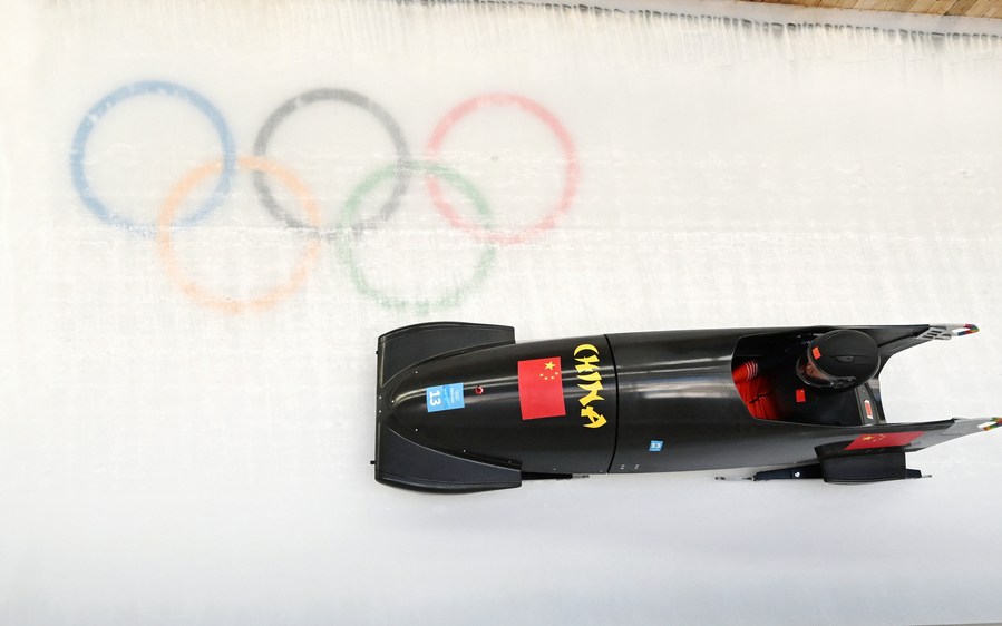 Ying Qing of China competes during the bobsleigh women's monobob competition at the Beijing 2022 Winter Olympics at the National Sliding Centre in Yanqing District, Beijing, China, February 14, 2022. /Xinhua