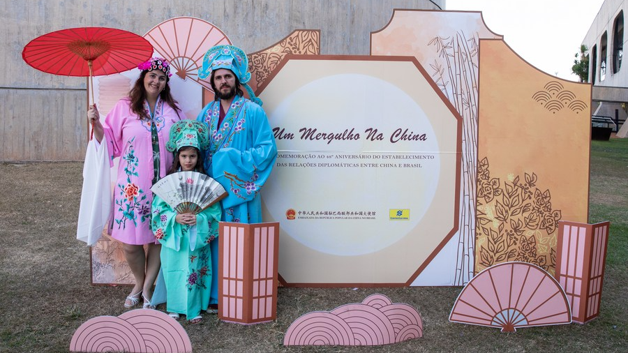 People wearing Chinese opera costumes pose for a photo during a Chinese culture experience week held in Brasilia, Brazil, August 13, 2022. /Xinhua
