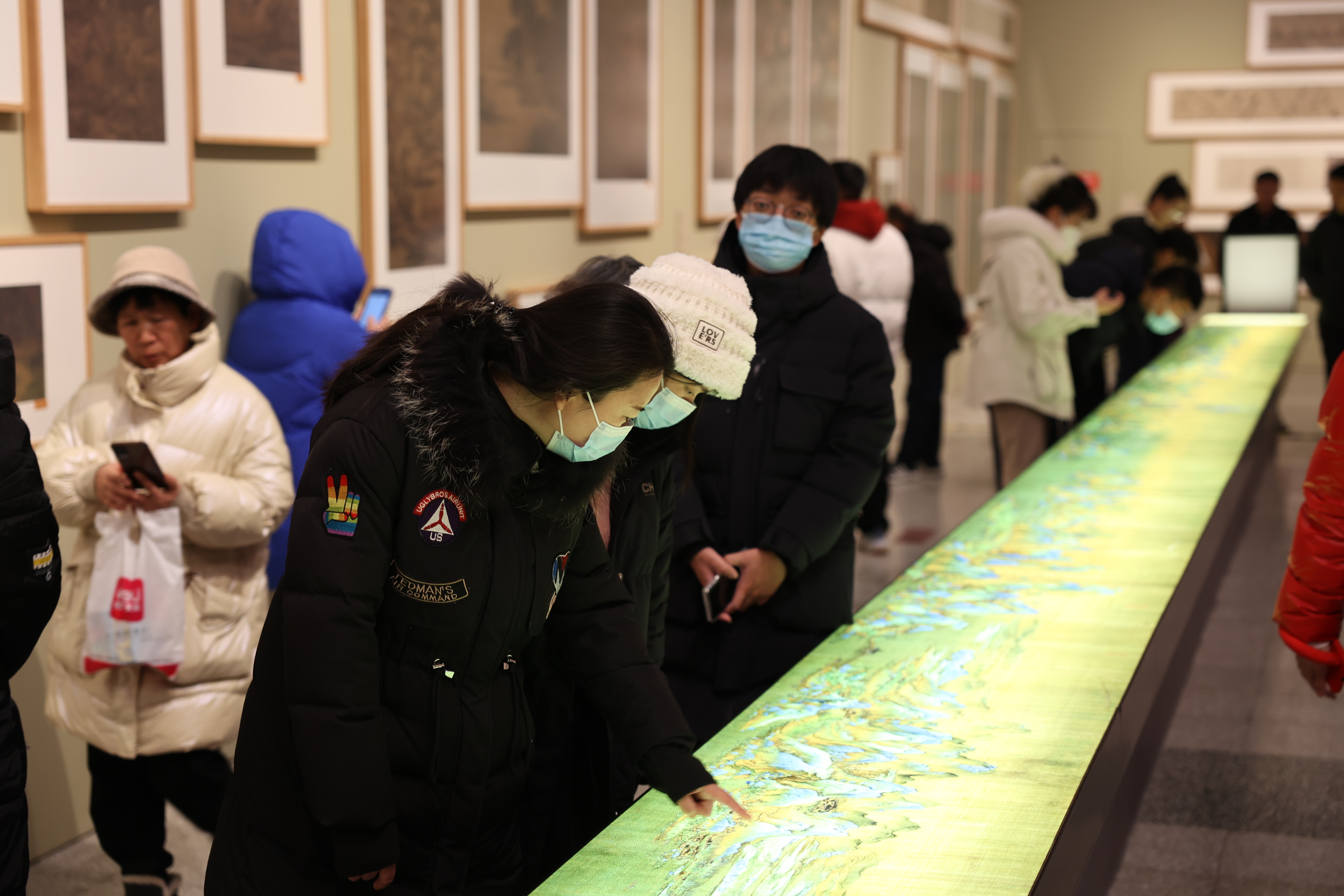A photo taken on January 22, 2024, shows people appreciating the exhibits displayed at the Hebei Museum in Shijiazhuang, Hebei Province. /IC