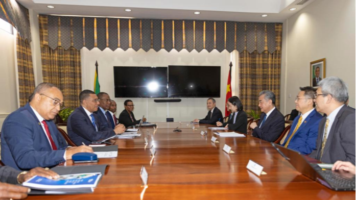 Jamaican Prime Minister Andrew Holness meets with visiting Chinese Foreign Minister Wang Yi, also a member of the Political Bureau of the Communist Party of China Central Committee, in Kingston, Jamaica, January 20, 2024. /Xinhua