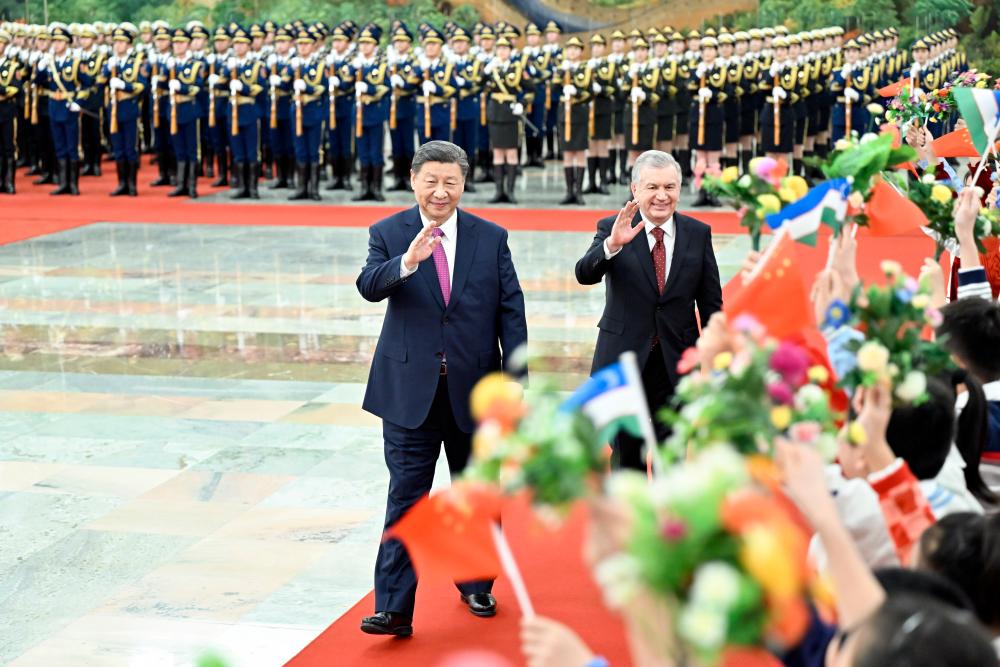Chinese President Xi Jinping holds a welcoming ceremony for President of the Republic of Uzbekistan Shavkat Mirziyoyev at the Great Hall of the People, prior to their talks in Beijing, capital of China, January 24, 2024. /Xinhua