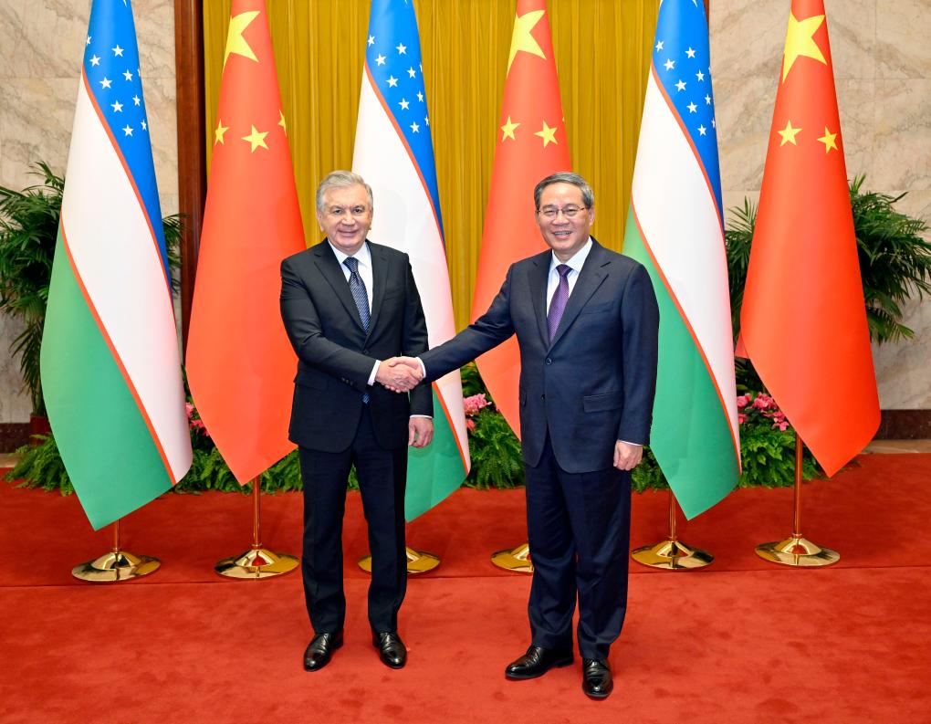 Chinese Premier Li Qiang meets with President of the Republic of Uzbekistan Shavkat Mirziyoyev at the Great Hall of the People in Beijing, capital of China, January 24, 2024. /Xinhua