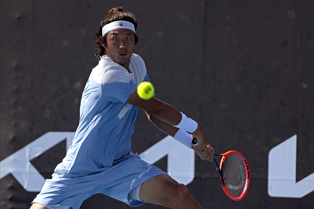 Zhang Zhizhen of China plays a backhand return to Federico Coria of Argentina (not pictured) during their Australian Open singles match in Melbourne, Australia, January 15, 2024. /CFP