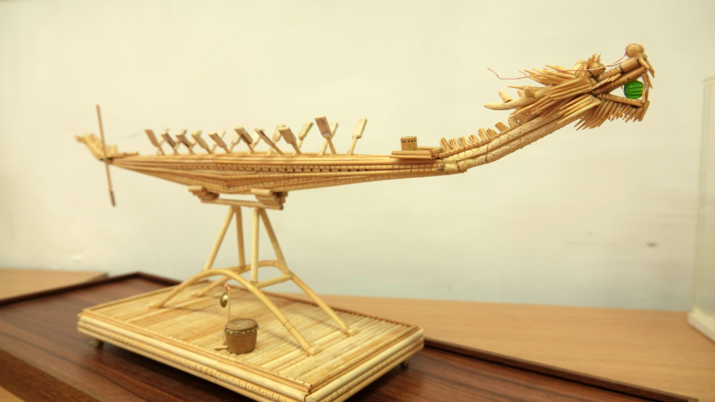 Photo taken on January 24, 2024 in Zhuhai, Guangdong, shows a model of a dragon boat made from upcycled disposable tableware. /CFP