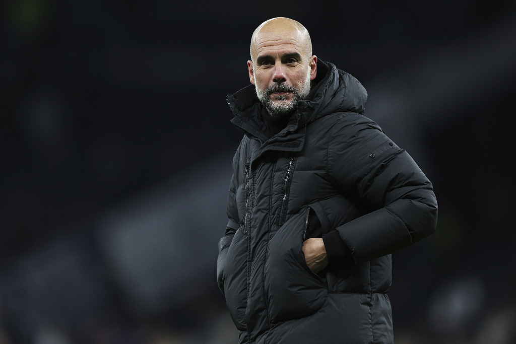 Pep Guardiola, manager of Manchester City, looks on during the FA Cup game against Tottenham Hotspur at the Tottenham Hotspur Stadium in London, England, January 26, 2024. /CFP