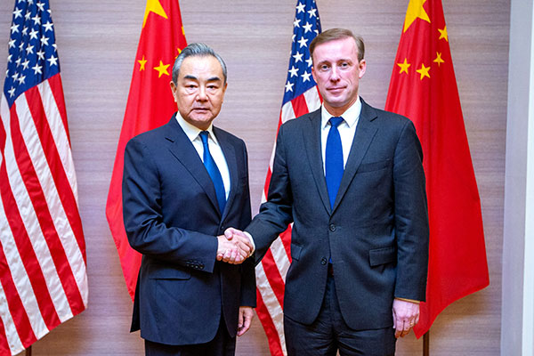 Chinese Foreign Minister Wang Yi shakes hands with U.S. National Security Advisor Jake Sullivan in Bangkok, Thailand. /Chinese Foreign Ministry