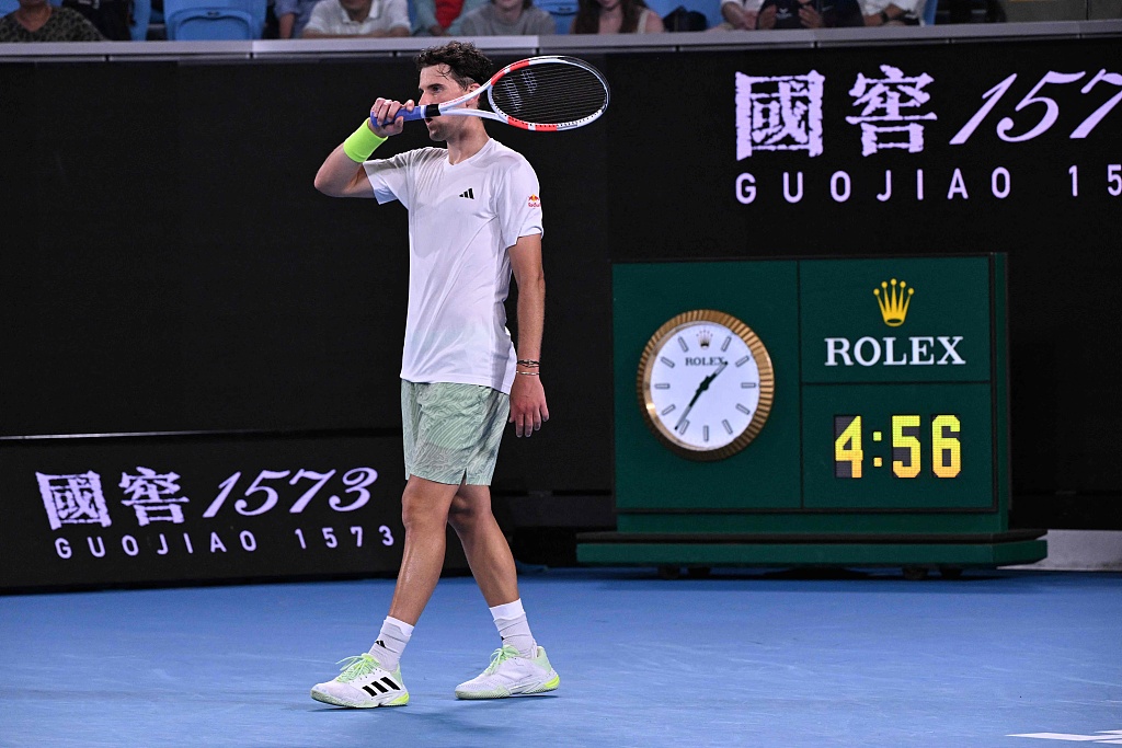 Austria's Dominic Thiem reacts as the Rolex shows 4:56 during his match with Felix Auger-Aliassime in Melbourne, Australia, January 15, 2024. /CFP