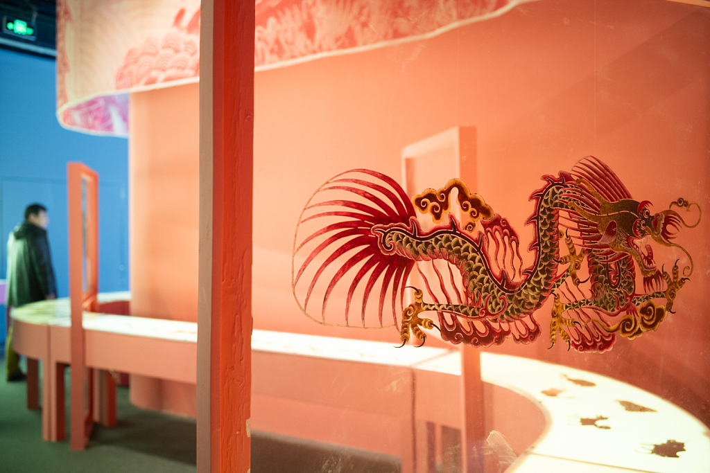 A shadow puppet in the shape of a loong or Chinese dragon is seen on display at the China Millennium Monument in Beijing during a special exhibition on January 5, 2024. /CFP