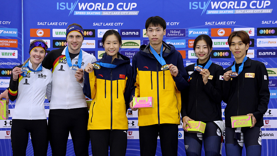 L-R: Team Germany, China, and South Korea celebrate after the mixed relay race at the speed skating World Cup in Salk Lake City, U.S., January 28, 2024. /CFP