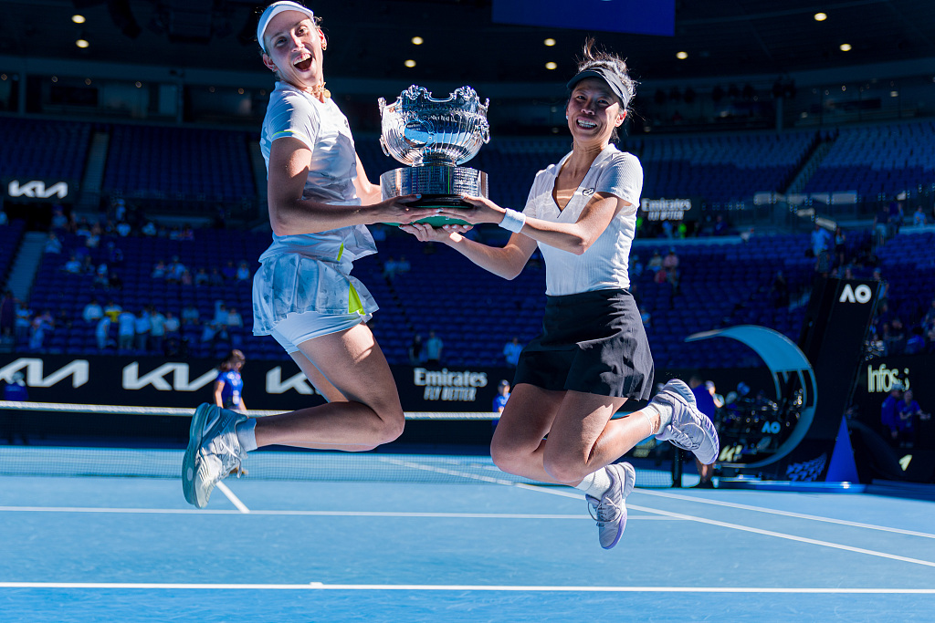 Hsieh Su-wei (R) of Chinese Taipei and Elise Mertens of Belgium celebrate after winning the women's doubles title at the Australian Open at Melbourne Park in Melbourne, Australia, January 28, 2024. /CFP