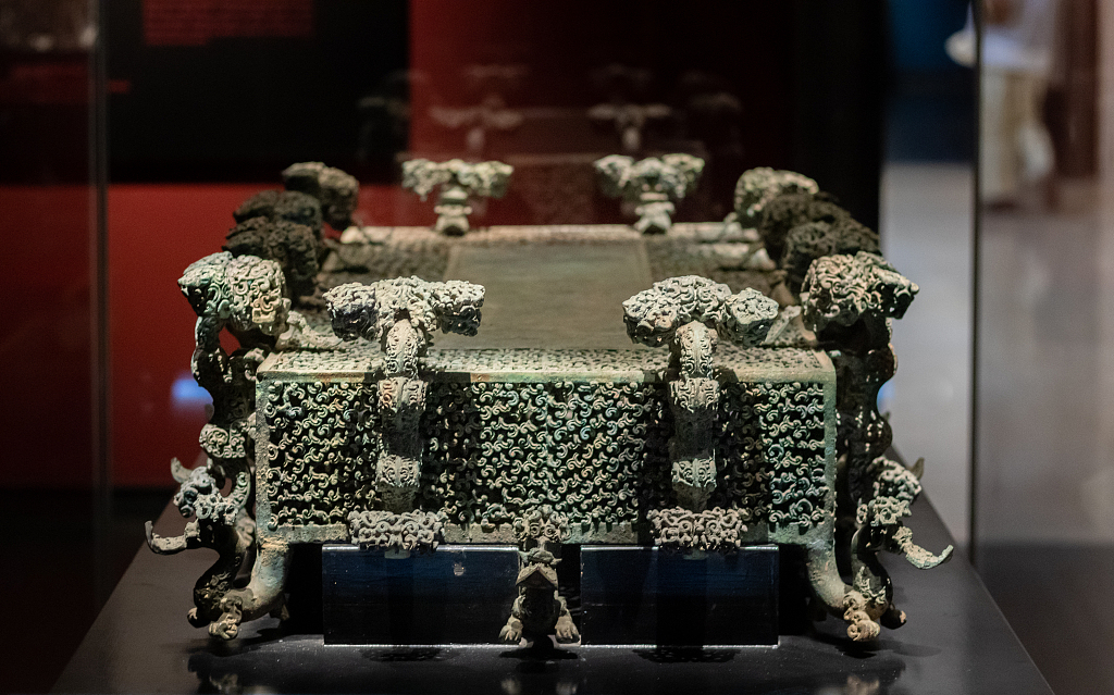 A file photo shows a cloud-patterned bronze artifact displayed at the Henan Museum in Zhengzhou, Henan Province, China. /CFP