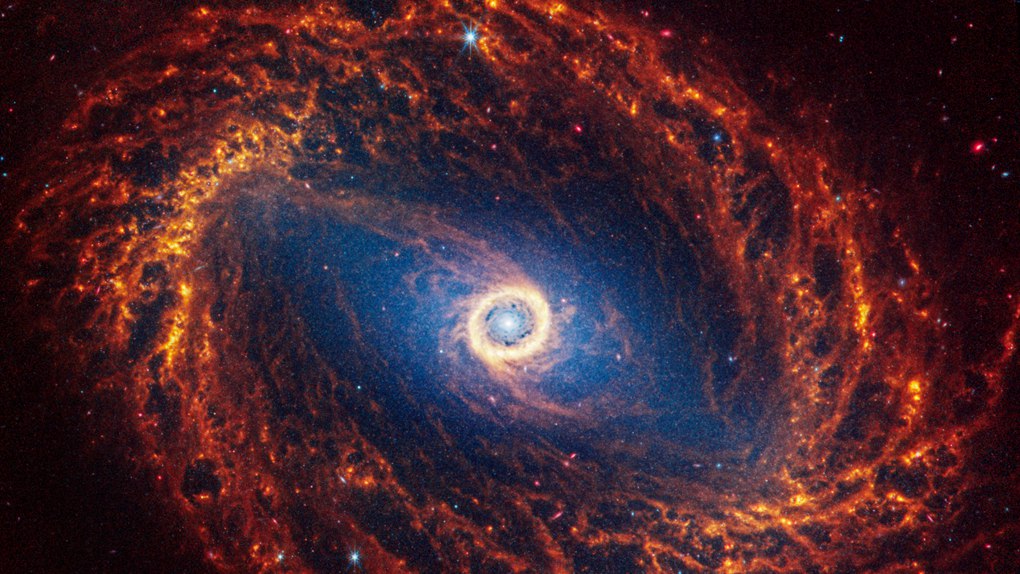 Spiral galaxy NGC 1512, 30 million light years away in the constellation Horologium. /NASA