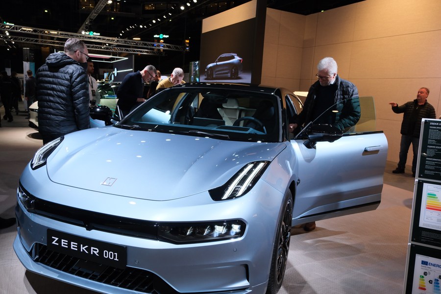People look at an electric vehicle made by Zeekr at the Swedish eCarExpo 2024 in Stockholm, Sweden, February 2, 2024. /Xinhua