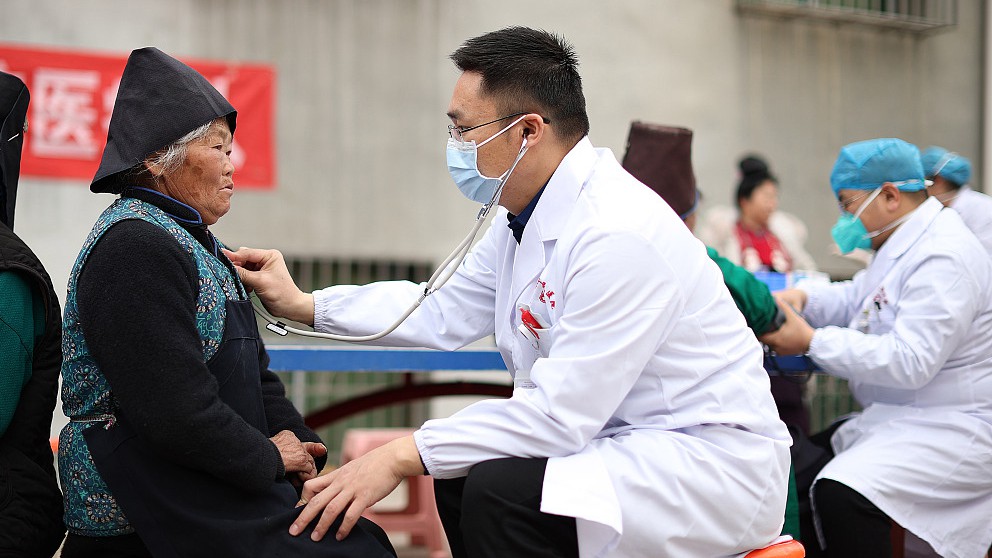 Doctors provide medical services to local villagers, Qiandongnan Miao and Dong Autonomous Prefecture, Guizhou Province, January 11, 2023. /CFP
