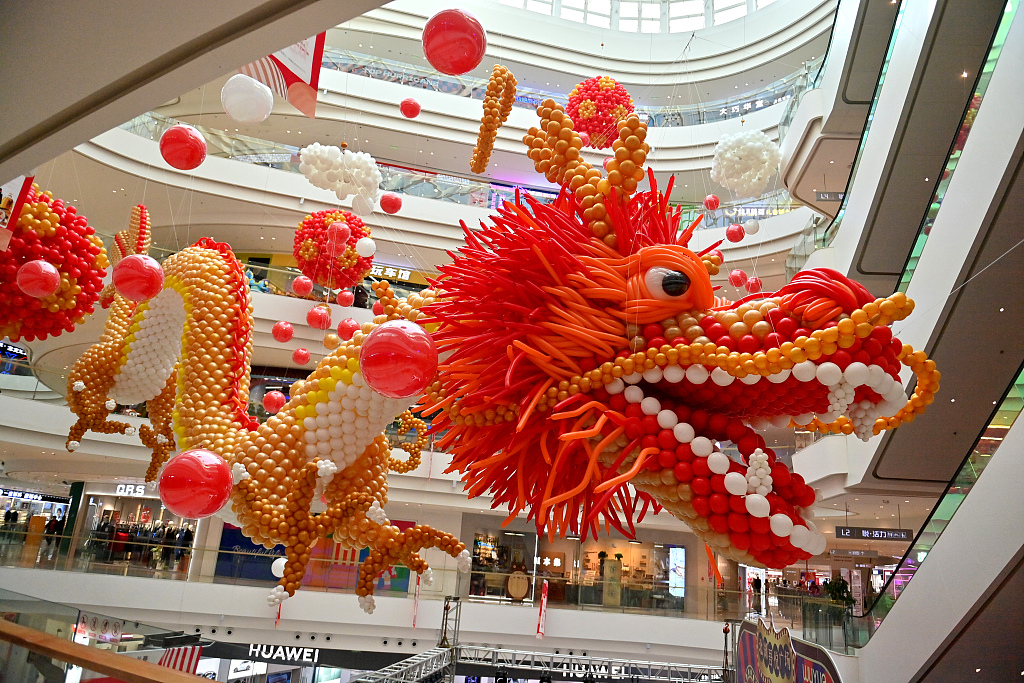 A dragon made of balloons is displayed at a shopping mall to celebrate the Spring Festival, Changchun City, northeast China's Jilin Province, February 6, 2024. /CFP