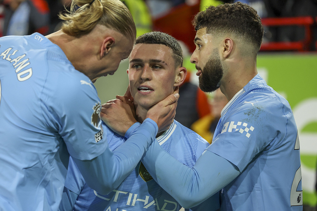 Manchester City's Phil Foden (C) celebrates with Erling Haaland (L) and Josko Gvardiol during their clash with Brentford at the Gtech Community Stadium in London, England, February 5, 2024. /CFP