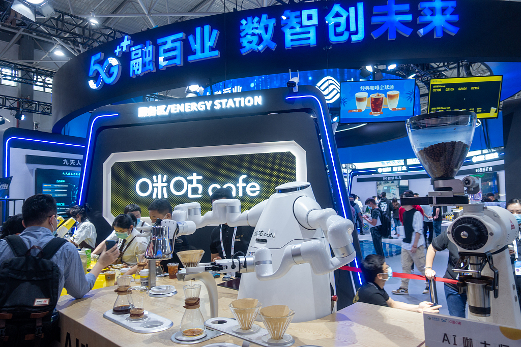 A 5G AI coffee master brews coffee at the exhibition hall of the 2021 China International Big Data Industry Expo in Guiyang City, Guizhou, May 27, 2021. /CFP
