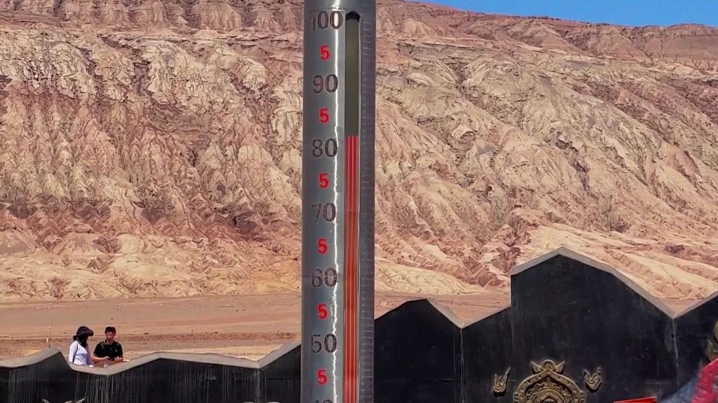 The surface temperature in the scenic spot of the Huoyan (Flaming) Mountain reached over 80 degrees Celsius in Turpan Basin, northwest China's Xinjiang Uygur Autonomous Region, July 16, 2023. /CFP