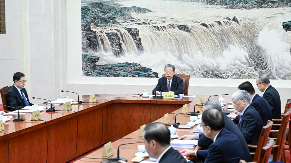 Zhao Leji (C), chairman of the National People's Congress (NPC) Standing Committee, presides over the 19th meeting of the Council of Chairpersons of the 14th NPC Standing Committee at the Great Hall of the People in Beijing, capital of China, February 7, 2024. /Xinhua