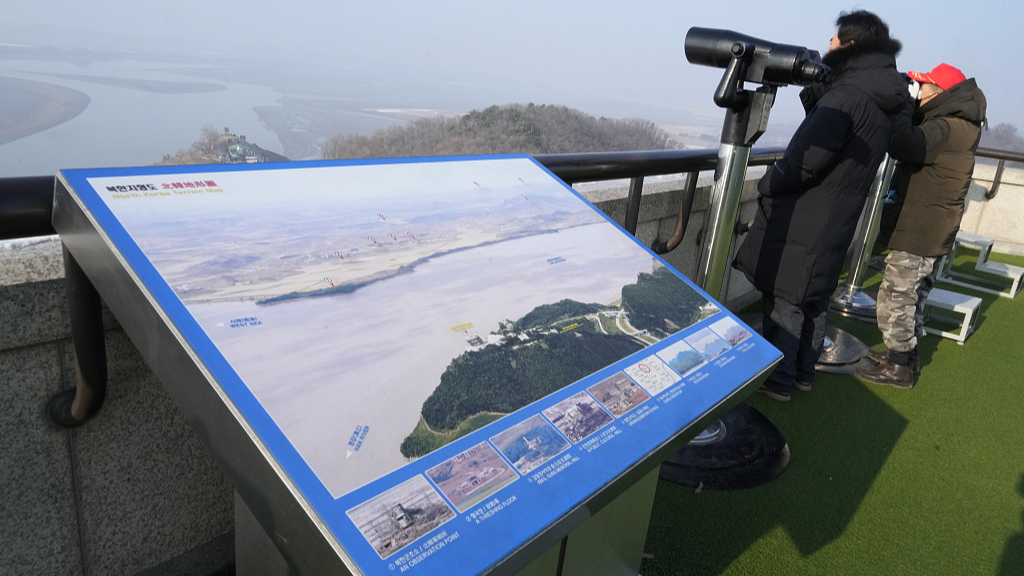 Visitors watch the Democratic People's Republic of Korea side from the Unification Observation Post in Paju, Republic of Korea, January 10, 2024. /CFP