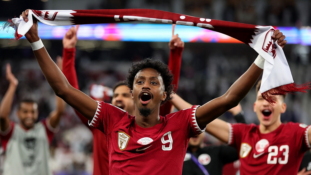 Yusuf Abdurisag of Qatar celebrates victory following their Asian Cup clash with Iran at Al Thumama Stadium in Doha, Qatar, February 7, 2024. /CFP