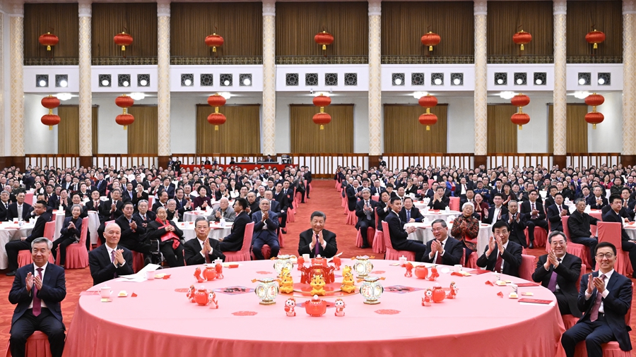 Party and state leaders Xi Jinping, Li Qiang, Zhao Leji, Wang Huning, Cai Qi, Ding Xuexiang, Li Xi and Han Zheng attend a Spring Festival reception at the Great Hall of the People in Beijing, China, February 8, 2024. /Xinhua
