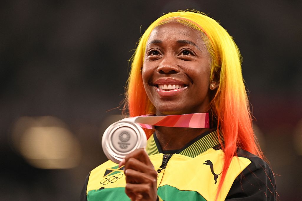 Shelly-Ann Fraser-Pryce of Jamaica poses with the women's 100-meter silver medal after competing in the event's final at the Olympic Games in Tokyo, Japan, August 1, 2021. /CFP