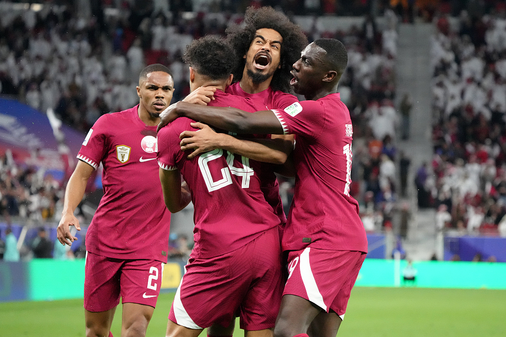 Qatar's players celebrate their team's third goal during their Asian Cup clash with Iran at Al Thumama Stadium in Doha, Qatar, February 7, 2024. /CFP